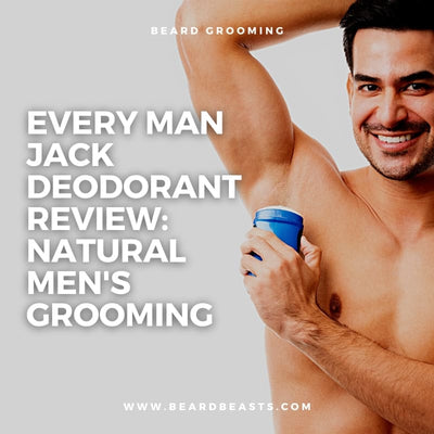 Smiling man applying Every Man Jack deodorant showcasing natural grooming essentials - Find the full product review at BeardBeasts.com