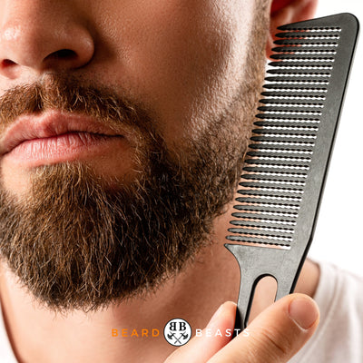 a man combing his beard wondering how to train your beard