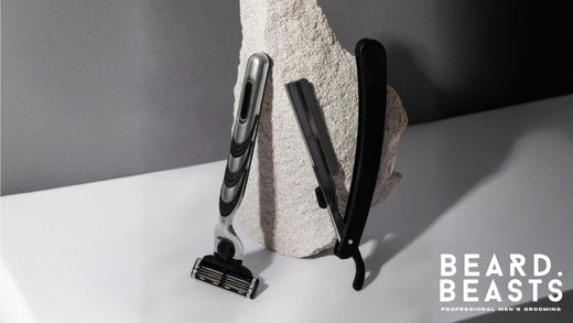 Side-by-side image of a multi blade razor and a single blade razor against a textured stone backdrop, illustrating the design differences in the single blade razor vs multi blade razor debate.