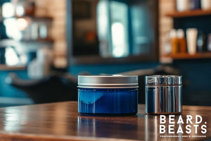 A barbershop counter displaying a blue hair gel container and a silver tin of hair wax, highlighting the differences in texture and finish in the hair gel vs hair wax debate.