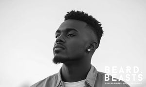 A stylish fade haircut for Black men, featuring a sharp high fade that blends seamlessly into a textured top. 