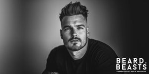 Man with a textured pompadour hairstyle and a beard