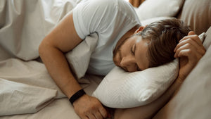 Man embracing a restful sleep as part of a rejuvenating morning routine for men.