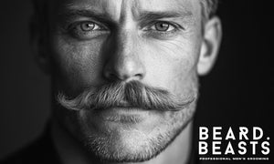 Close-up black and white portrait of a man with a Handlebar mustache, one of the most iconic types of mustaches.